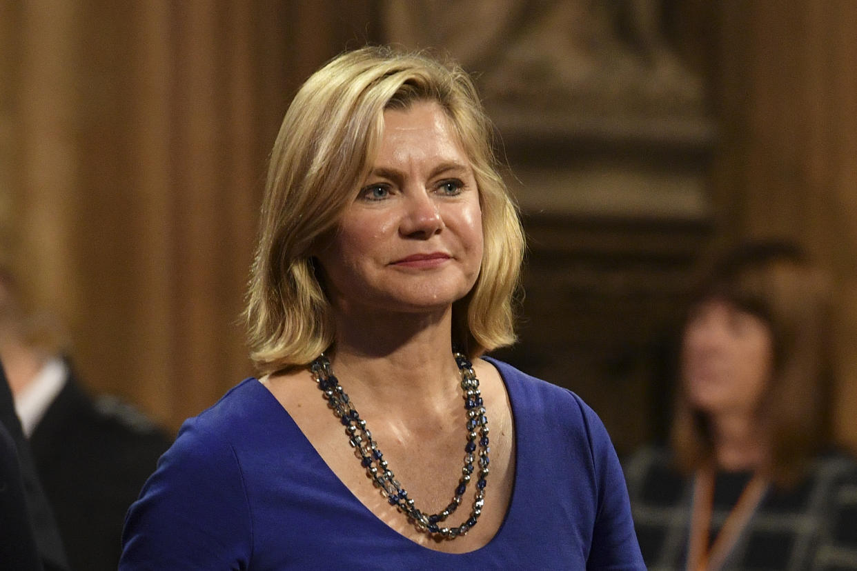 Justine Greening in the Central Lobby as she walks back to the House of Commons after the Queen's Speech during the State Opening of Parliament ceremony in London.