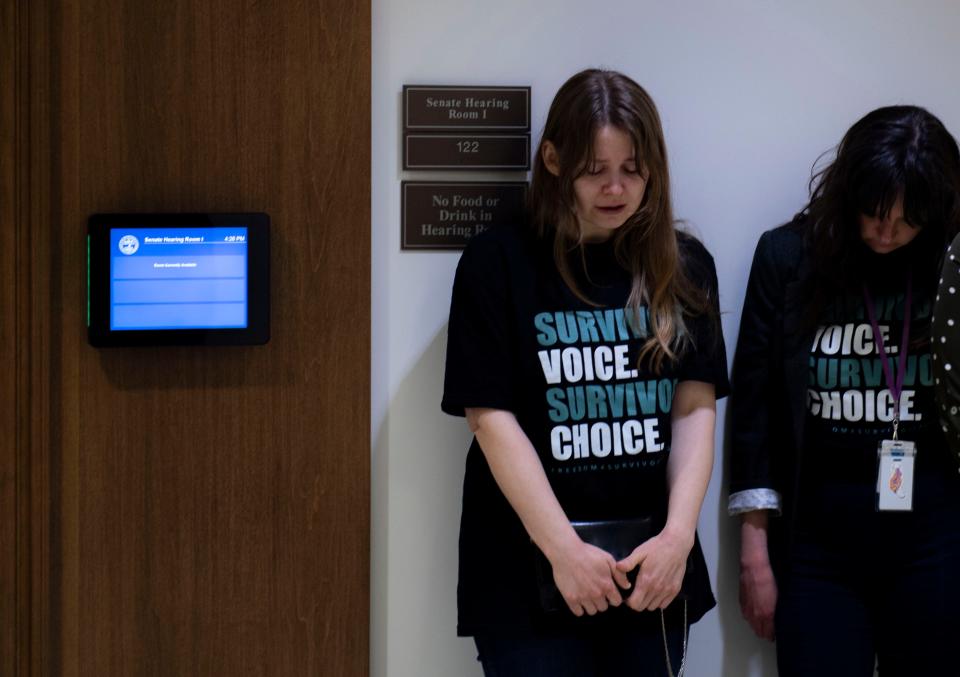 Anna Culver with the Sexual Assault Center, weeps outside of the Senate hearing doors after the Senate Bill 857, sponsored by Sen. Ferrell Haile, R-Gallatin, that would legalize abortions for pregnancies that resulted from rape or incest under limited circumstances was effectively tabled during a committee hearing at Cordell Hull Building in Nashville , Tenn., Tuesday, Feb. 28, 2023. 