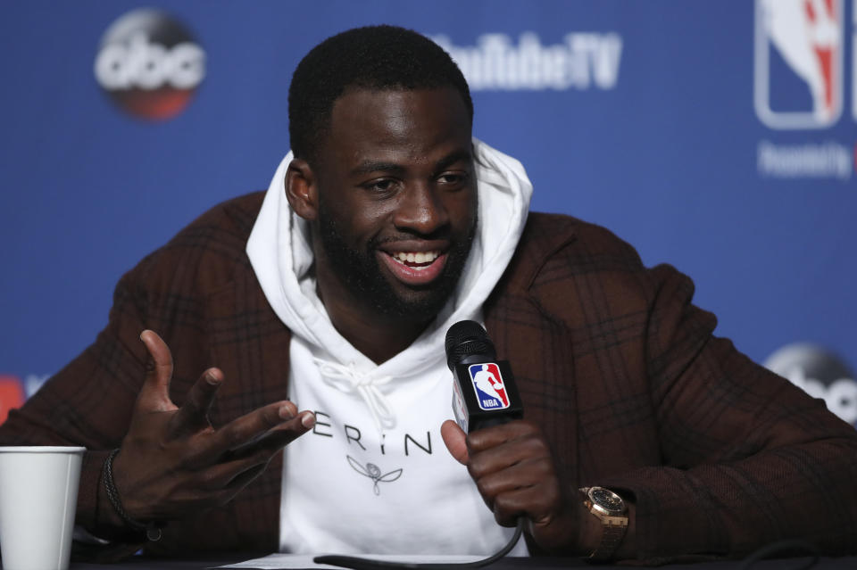 Golden State Warriors forward Draymond Green speaks during a news conference following Game 3 of basketball's NBA Finals, early Wednesday June 7, 2018, in Cleveland. The Warriors defeated the Cleveland Cavaliers 110-102 to take a 3-0 lead in the series. (AP Photo/Carlos Osorio)