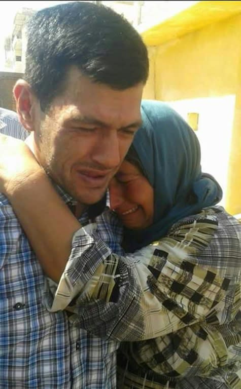 Syrian migrant Abdullah Kurdi mourns his family in Kobane, on September 4, 2015 after losing his wife and two sons in a boat sinking as they tried to reach Greece