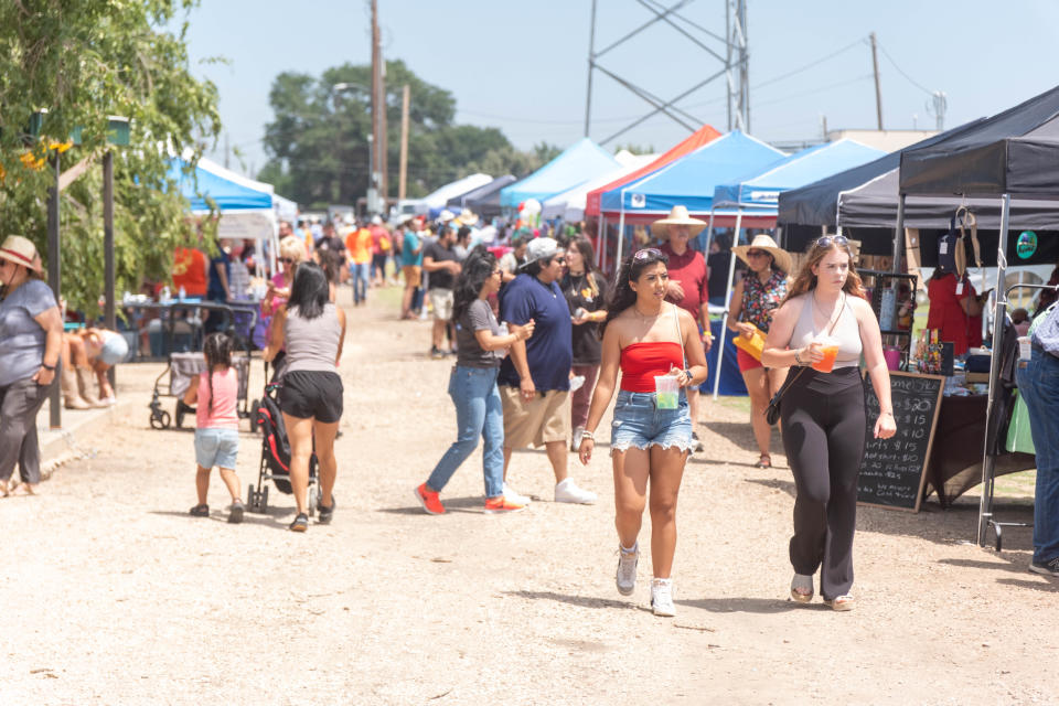 Attendees from all across the Texas panhandle enjoy the shopping  Saturday at Friona's 17th annual Cheeseburger Festival.