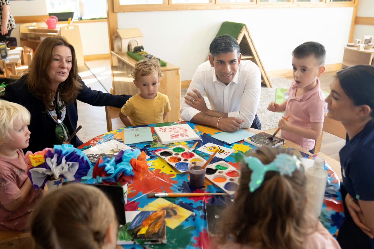 childcare costs Britain's Prime Minister Rishi Sunak (C) and Britain's Education Secretary Gillian Keegan (L) visit the Busy Bees nursery in Harrogate, North Yorkshire, on August 21, 2023. (Photo by Danny Lawson / POOL / AFP) (Photo by DANNY LAWSON/POOL/AFP via Getty Images)