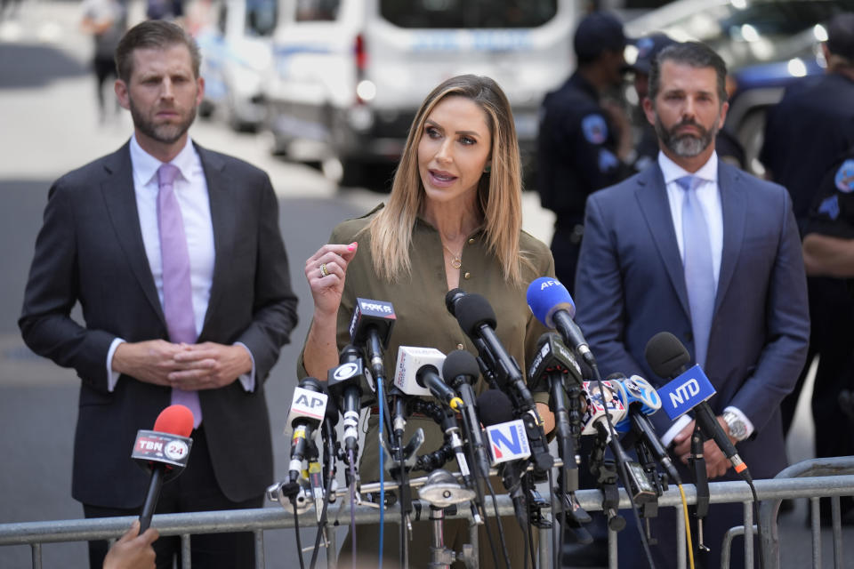 Lara Trump speaks to reporters across the street from former President Donald Trump's criminal trial in New York, Tuesday, May 28, 2024. (AP Photo/Seth Wenig)