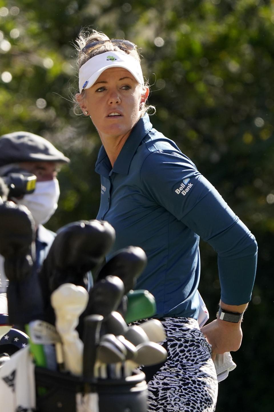Amy Olson prepares to hit off the third tee during the first round of the U.S. Women's Open golf tournament in Houston, Thursday, Dec. 10, 2020. (AP Photo/Eric Gay)