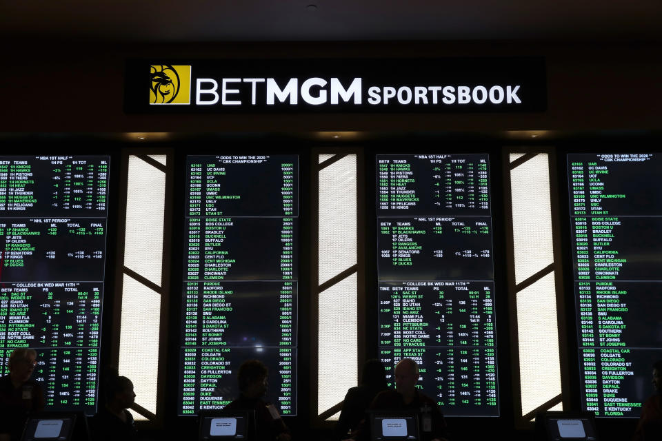 Odds are shown during the launch of legalized sports betting in Michigan at the MGM Grand Detroit casino in Detroit, Wednesday, March 11, 2020. (AP Photo/Paul Sancya)