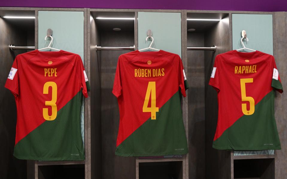 The shirts worn by Pepe , Ruben Dias and Raphael Guerreiro of Portugal are displayed in the dressing room prior to the FIFA World Cup Qatar 2022 Group H match between Portugal and Uruguay at Lusail Stadium on November 28, 2022 in Lusail City, Qatar - Mike Hewitt - FIFA/FIFA via Getty Image