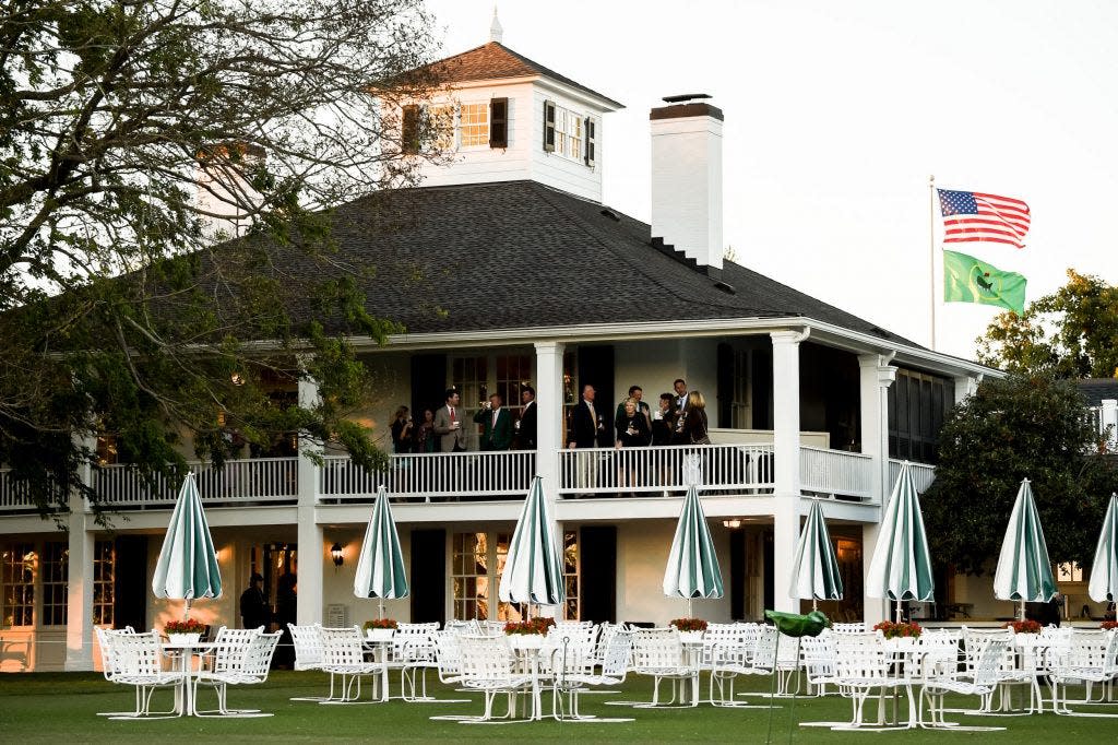 The Augusta National clubhouse at sunset during the second round of the 2017 Masters Tournament.