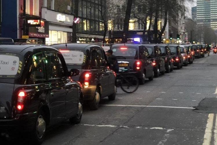 Black cabs parked along Tottenham Court Road on Monday: Twitter/DannyBoy