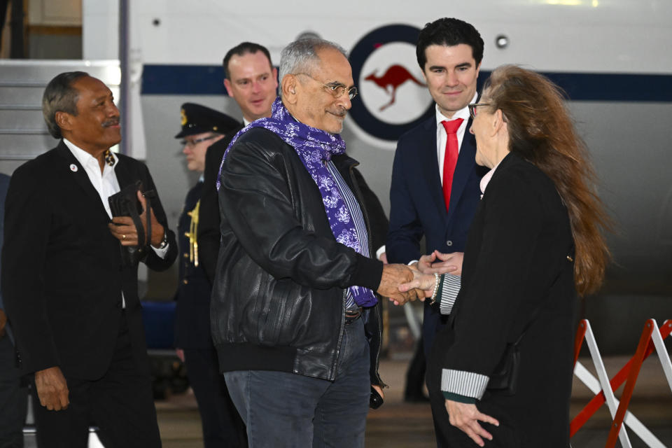 East Timor’s President Jose Ramos-Horta, center, is met by Lismore MP Jangle Saffin after arriving at Fairbairn Airport in Canberra, Australia, Tuesday, Sept. 6, 2022. Ramos-Horta is in Australia on a five day official visit to Australia. (Lukas Coch/AAP Image via AP)