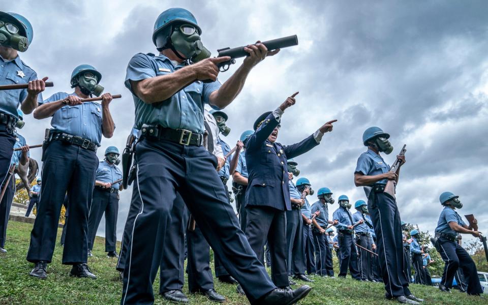 'When will we get it? When will this be right?': riot police shoot tear gas on protesters in The Trial of the Chicago 7 - Netflix