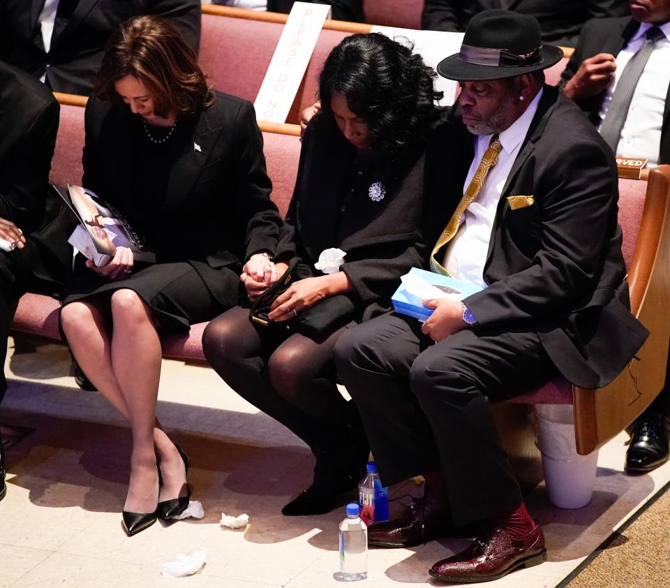 Vice President Kamala Harris holds the hand of RowVaughn Wells as she is held by her husband Rodney Wells during the funeral service for her son Tyre Nichols at Mississippi Boulevard Christian Church in Memphis, Tenn., on Wednesday, Feb. 1, 2023.