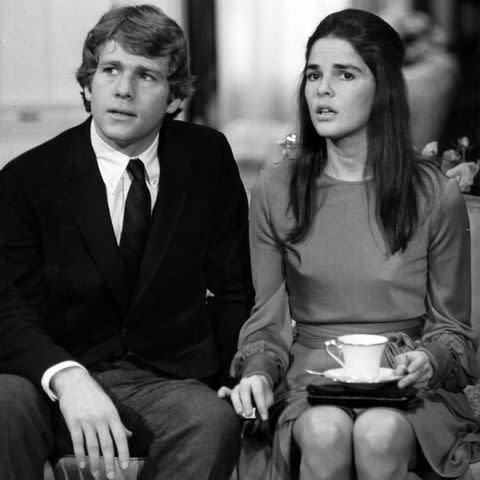 <p>Paramount/Getty</p> Ryan O'Neal and Ali MacGraw in 'Love Story'