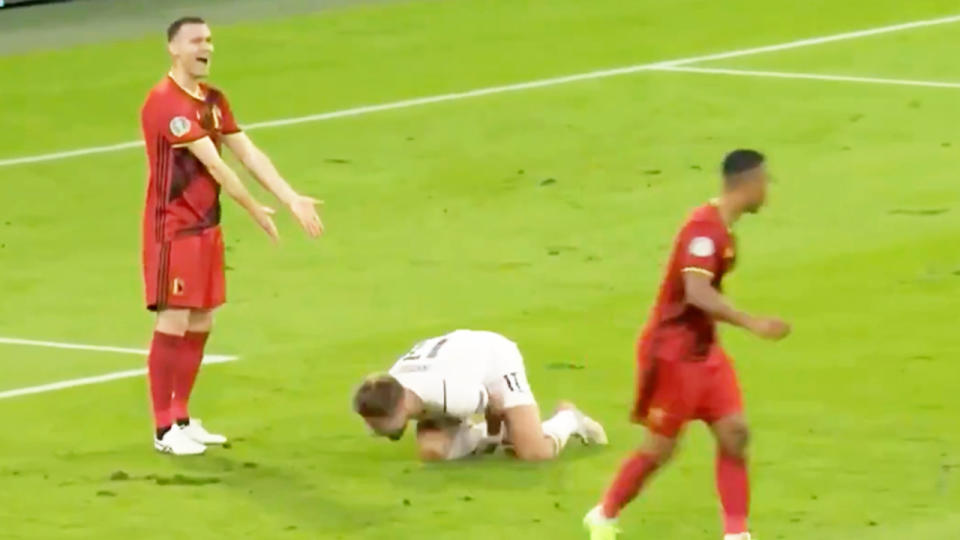 Ciro Immobile (pictured on the ground) rolling around after a challenge against Belgium.