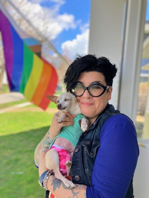 The author and her dog in front of her Rochester house. 