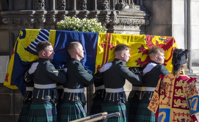 The coffin of the Queen is taken to a hearse as it departs St Giles’ Cathedral 