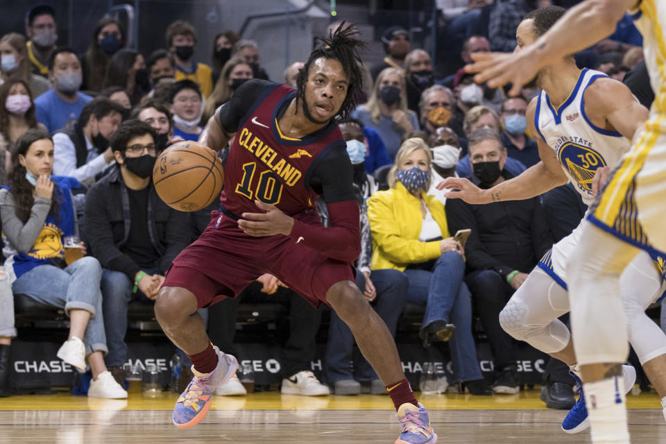 Cleveland Cavaliers guard Darius Garland (10) dribbles against the Golden State Warriors during the first half of an NBA basketball game in San Francisco, Sunday, Jan. 9, 2022. (AP Photo/John Hefti)