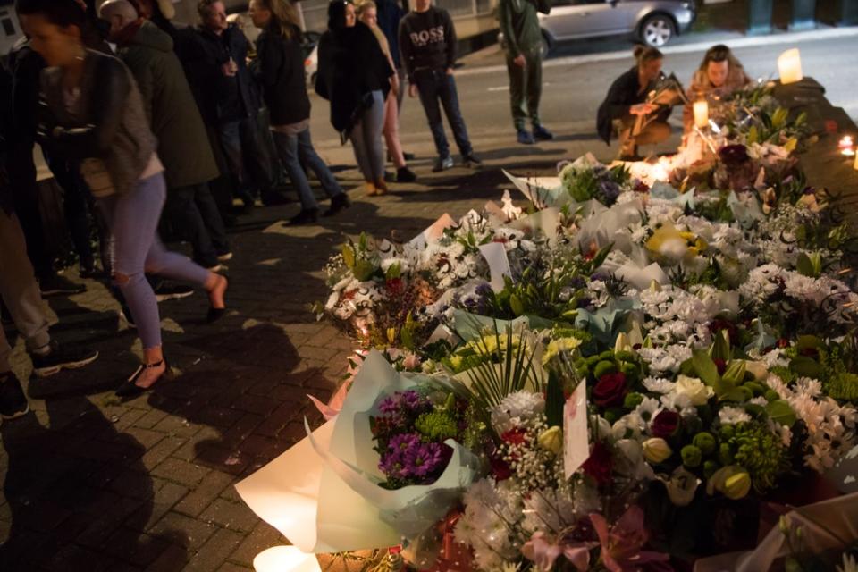 Floral tributes are left at a house on Burnaby Road in Coventry in 2019 (Aaron Chown/PA) (PA Archive)