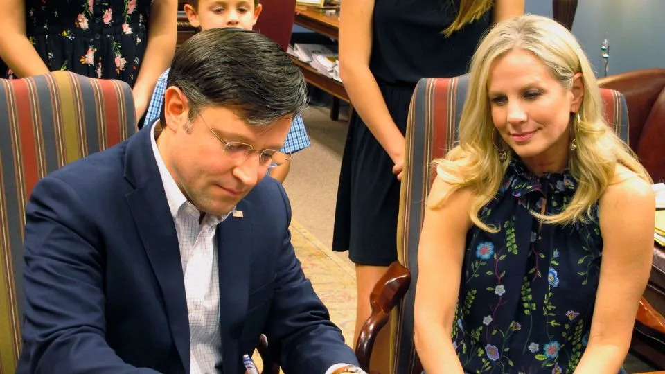 In this 2018 photo, US Rep. Mike Johnson files his paperwork at the secretary of state's office as he qualified for his congressional re-election bid in Baton Rouge, Louisiana. - Melinda Deslatte/AP