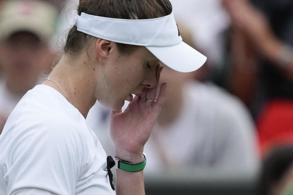 Elina Svitolina of Ukraine reacts after defeating Xinyu Wang of China in their fourth round match at the Wimbledon tennis championships in London, Monday, July 8, 2024. (AP Photo/Mosa'ab Elshamy)