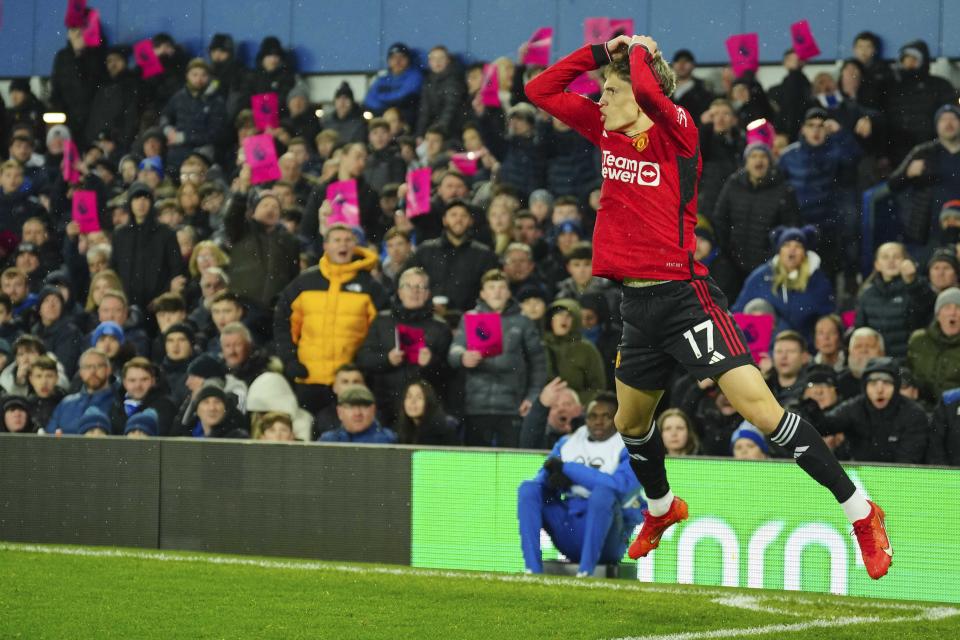 Manchester United's Alejandro Garnacho celebrates after scoring his side's first goal during the English Premier League soccer match between Everton and Manchester United, at Goodison Park Stadium, in Liverpool, England, Sunday , Nov. 26, 2023. (AP Photo/Jon Super)