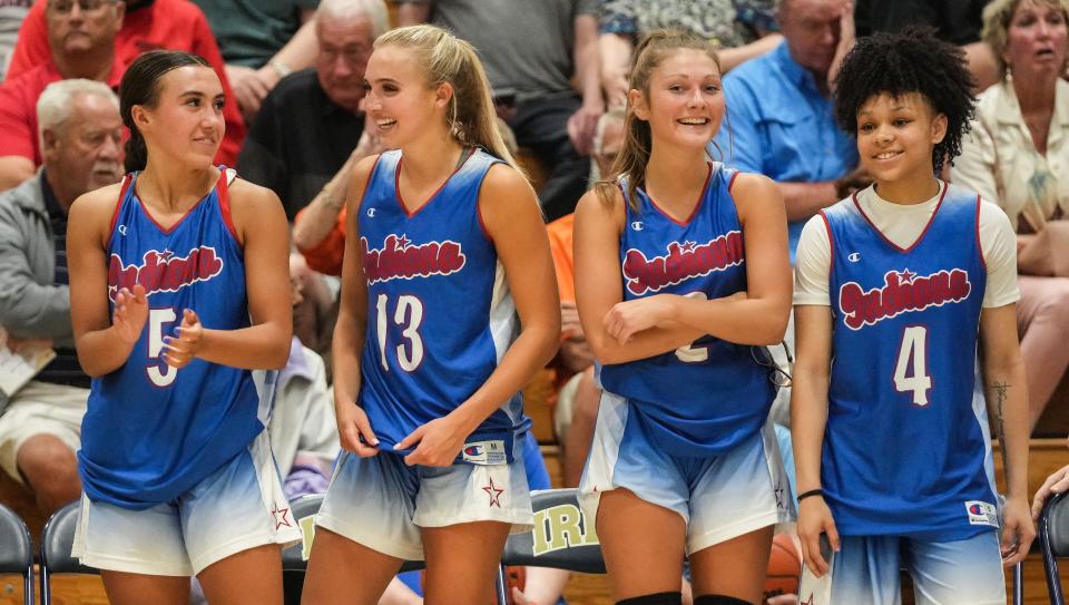 Junior All-Star Reagan Wilson (5), Chloe Screen (13),  Alli Harness (2) and Jordyn Poole (4) stand on the sidelines Wednesday, June 7, 2023, during the Indiana All-Stars vs. Juniors girls game at Cathedral High School in Indianapolis. 