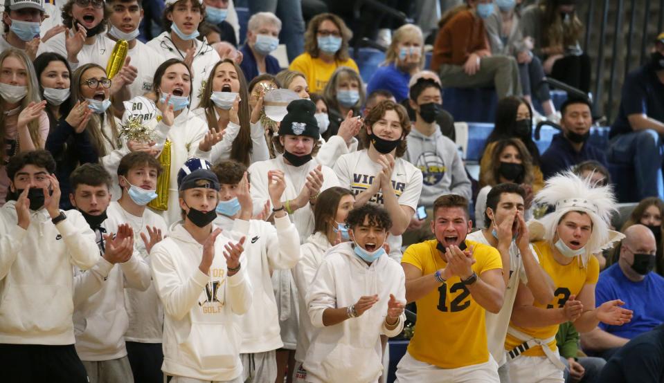 Victor fans scream their support late in the match during the Section V Class AA championship finals match up Saturday, Nov. 6, 2021 at Gates Chili High School. 