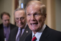 Sen. Bill Nelson, D-Fla., whose re-election contest against Republican Gov. Rick Scott is still undecided, is joined by Senate Minority Leader Chuck Schumer, D-N.Y., left, at a news conference at the Capitol in Washington, Tuesday, Nov. 13, 201816. (AP Photo/J. Scott Applewhite)