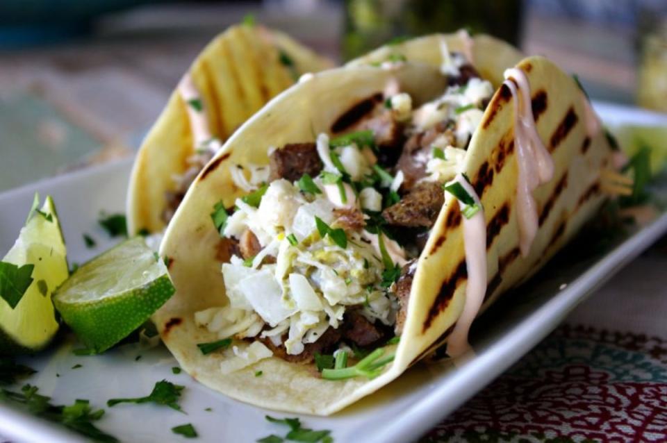 <p>Shea Goldstein</p><p>The most amazing carnitas, <a href="https://parade.com/914479/alison-ashton/alton-brown-best-kitchen-tools/" rel="nofollow noopener" target="_blank" data-ylk="slk:sous vide style;elm:context_link;itc:0;sec:content-canvas" class="link ">sous vide style</a>, seared on a really hot grill, then chopped all up. <a href="https://parade.com/842396/sheagoldstein/out-of-this-world-sous-vide-carnitas-tacos/" rel="nofollow noopener" target="_blank" data-ylk="slk:Get the recipe HERE;elm:context_link;itc:0;sec:content-canvas" class="link ">Get the recipe HERE</a>.</p>
