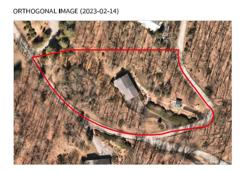 A satellite photo of Joseph Lowman’s home in Boone. Based on this single, grainy image of his roof, he got dropped by his insurer, Nationwide.