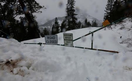 State highway 28 which rings Lake Tahoe is closed by snow at Crystal Bay, California, U.S., January 7, 2017. REUTERS/Bob Strong/Files