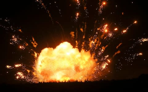 Massive fireballs light up the sky - Credit: AP
