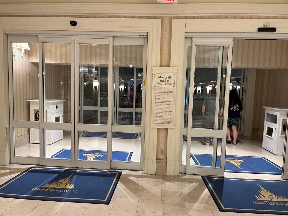 sliding doors that lead out to the monorail station attached to the grand floridian resort