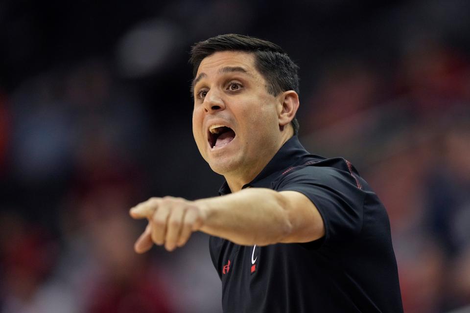 Cincinnati Bearcats head basketball coach Wes Miller during a game in 2021. Despite being somewhat new to town, Miller has a go-to Cincinnati chili order.