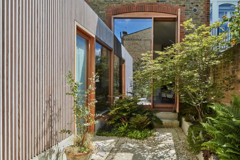 The large garden wraps around the bedroom (Juliet Murphy)