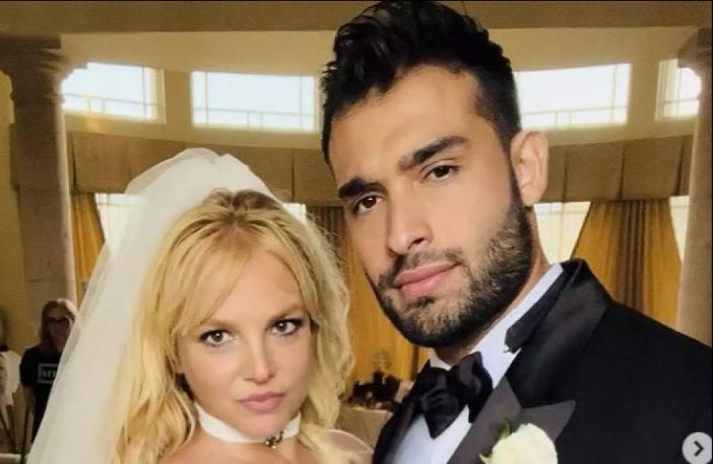 Britney Spears is said to have shown signs she knew her marriage to Sam Asghari could be headed for disaster – on their wedding day credit:Bang Showbiz