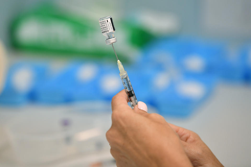 A nurse prepares the Pfizer COVID-19 vaccination during at Castle Hill Medical Centre.