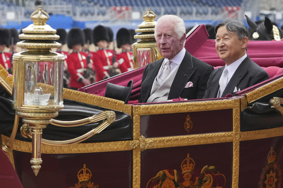 FILE - Britain's King Charles III, left and Japans Emperor Naruhito ride in a one carriage during the ceremonial welcome for the State Visit to Britain of the Emperor and Empress, in London, Tuesday, June 25, 2024. Naruhito and the Empress Masako, who studied at Oxford a few years after her husband, wrapped up a weeklong trip to Britain on Friday. Their itinerary combined the glitter and ceremony of a state visit with four days of less formal events that gave the royal couple an opportunity to revisit their personal connections to Britain. (AP Photo/Kin Cheung, Pool, File)