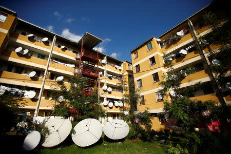 Television satellite dishes are seen at the Balderas condominium in Ethiopia's capital Addis Ababa, October 18, 2016. REUTERS/Tiksa Negeri