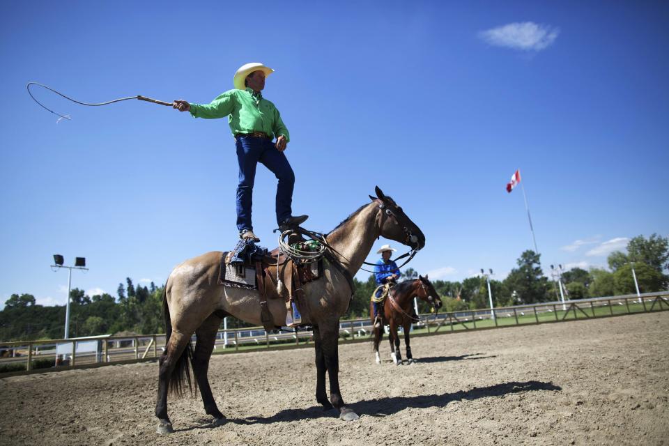 Redden of Ravenwood, Missouri prepares for the Cowboy Up Challenge during day 2 of the Calgary Stampede rodeo in Calgary