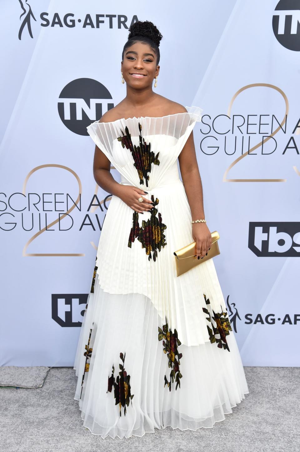 <h1 class="title">Lyric Ross with a Stuart Weitzman clutch and Atelier Swarovski jewelry</h1><cite class="credit">Photo: Getty Images</cite>