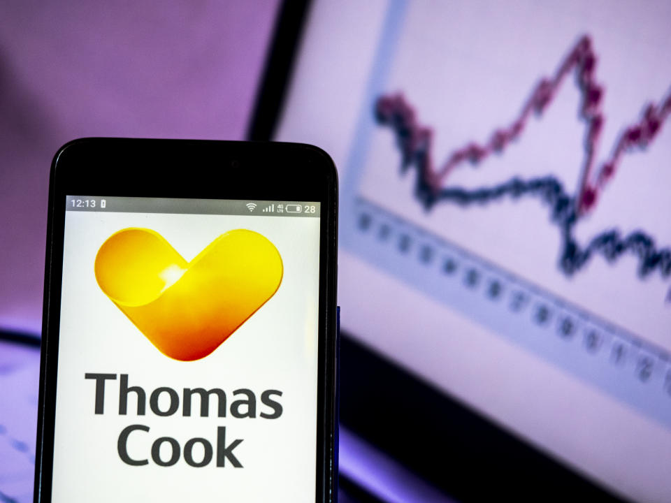 Thomas Cook Group plc logo seen displayed on a smart phone. Photo: Igor Golovniov/SOPA Images/LightRocket via Getty Images