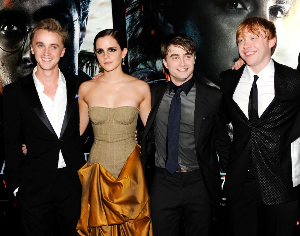 FILE - In this July 11, 2011 file photo, cast members, from left, Tom Felton, Emma Watson, Daniel Radcliffe and Rupert Grint pose together at the premiere of 