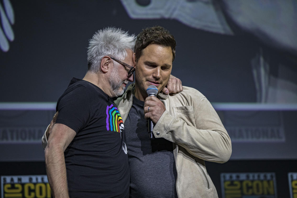 James Gunn and Chris Pratt speak onstage at the Marvel Cinematic Universe Mega-Panel during Comic-Con. (Photo: Daniel Knighton/Getty Images)