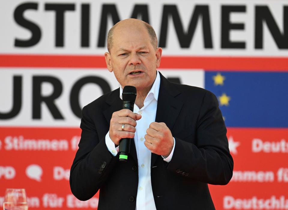 German Chancellor Olaf Scholz speaks at a major SPD rally for the European elections in Karlsruhe, Germany, over the weekend (AP)