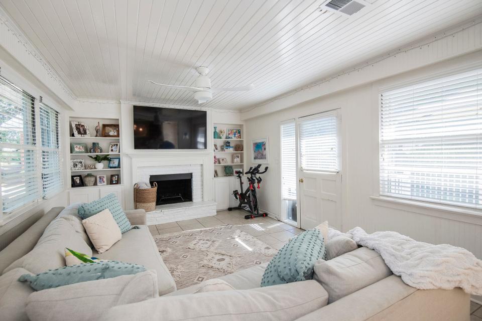 A secondary living area off the kitchen is perfect for relaxing and entertaining.