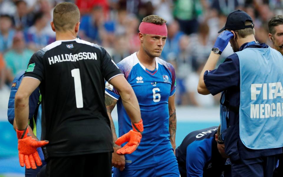 Ragnar Sigurdsson played on for some time despite suffering a head injury on Friday - REUTERS