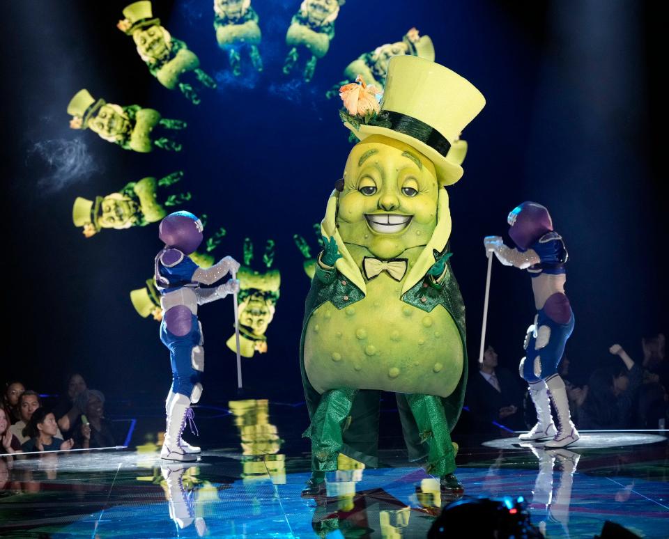 Person in giant Pickle costume performs on "The Masked Singer."