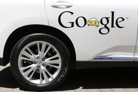 A Google self-driving vehicle is parked at the Computer History Museum after a presentation in Mountain View, California May 13, 2014. REUTERS/Stephen Lam