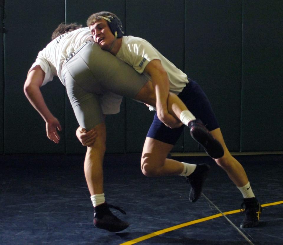 Josh Patterson, hitting a takedown at practice for the high school state championships during his senior year at Wayne in 2006.