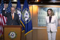 Senate Minority Leader Sen. Chuck Schumer of N.Y., joined by House Speaker Nancy Pelosi of Calif., speaks during a news conference on Capitol Hill in Washington, Thursday, Aug. 6, 2020. (AP Photo/Jose Luis Magana)